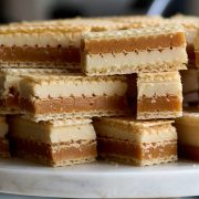 Decadent soft caramel and white chocolate ganache wafer bars made with silky smooth, soft, and chewy vanilla caramel, exquisite white chocolate ganache melts as soon as you put it in your mouth, and thin crunch wafers.